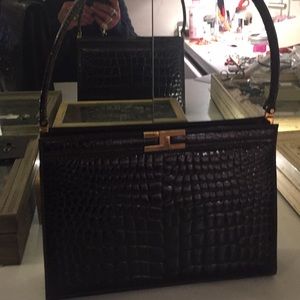 Vintage purse.hand bag is 12” wide and 8” tall